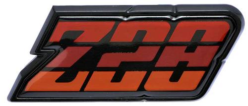 9637808 - 1980-81 Camaro Z28; Fuel Door Emblem; Red; with Hardware; GM Licensed
