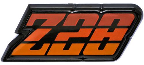 9637809 - 1980-81 Camaro Z28; Fuel Door Emblem; Orange; with Hardware; GM Licensed